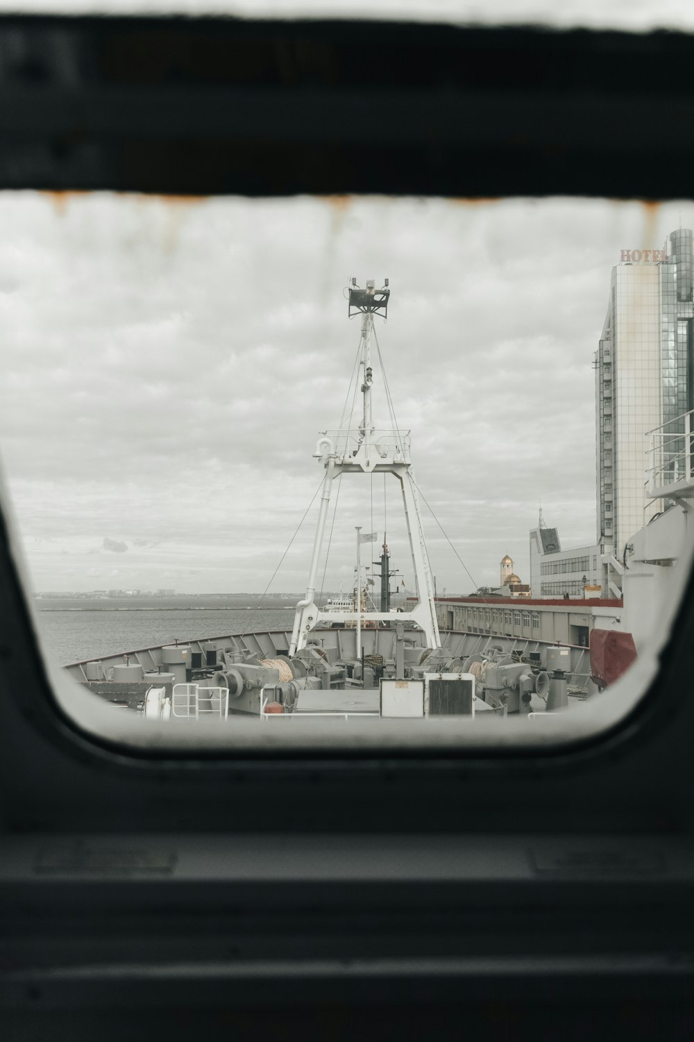 a view of a ship from inside a window