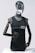 A metallic mannequin with a smooth, reflective head and dark, articulated arms is wearing a sleeveless shirt that reads 'personal trainer'. The mannequin stands upright against a plain light background, emphasizing the sleek design.