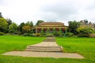 A beautifully landscaped garden surrounding a building.