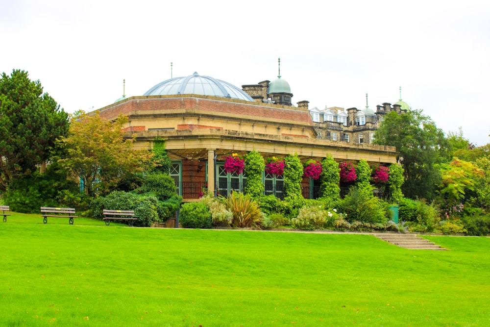 a building with a green lawn in front of it