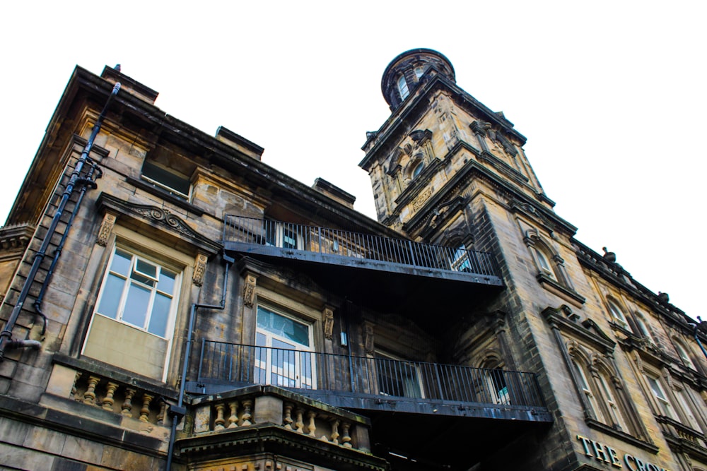 a tall building with a clock on the top of it