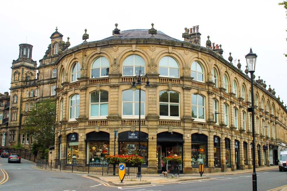 a large building on the corner of a street