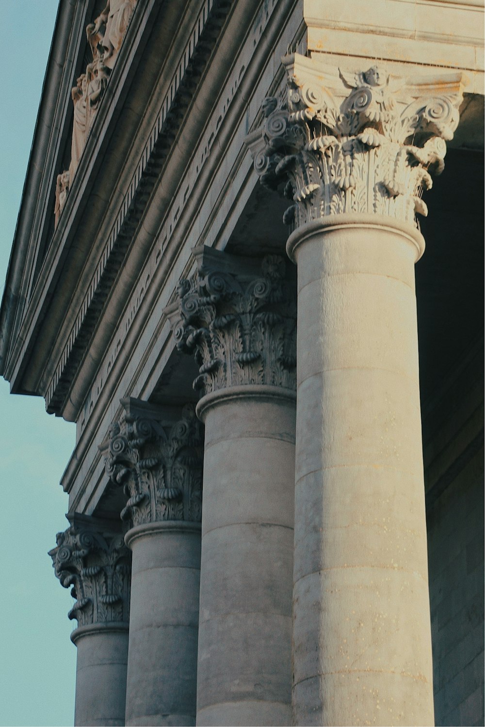 a close up of a column with a sky background