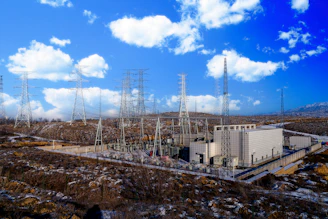 an aerial view of a power plant in the middle of nowhere