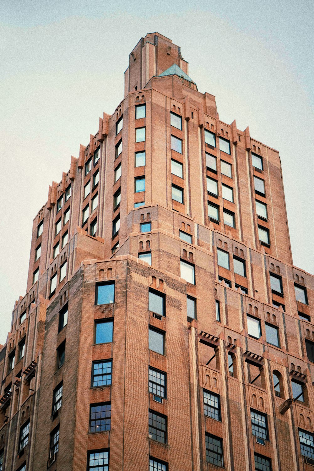 a very tall building with a clock on the top of it