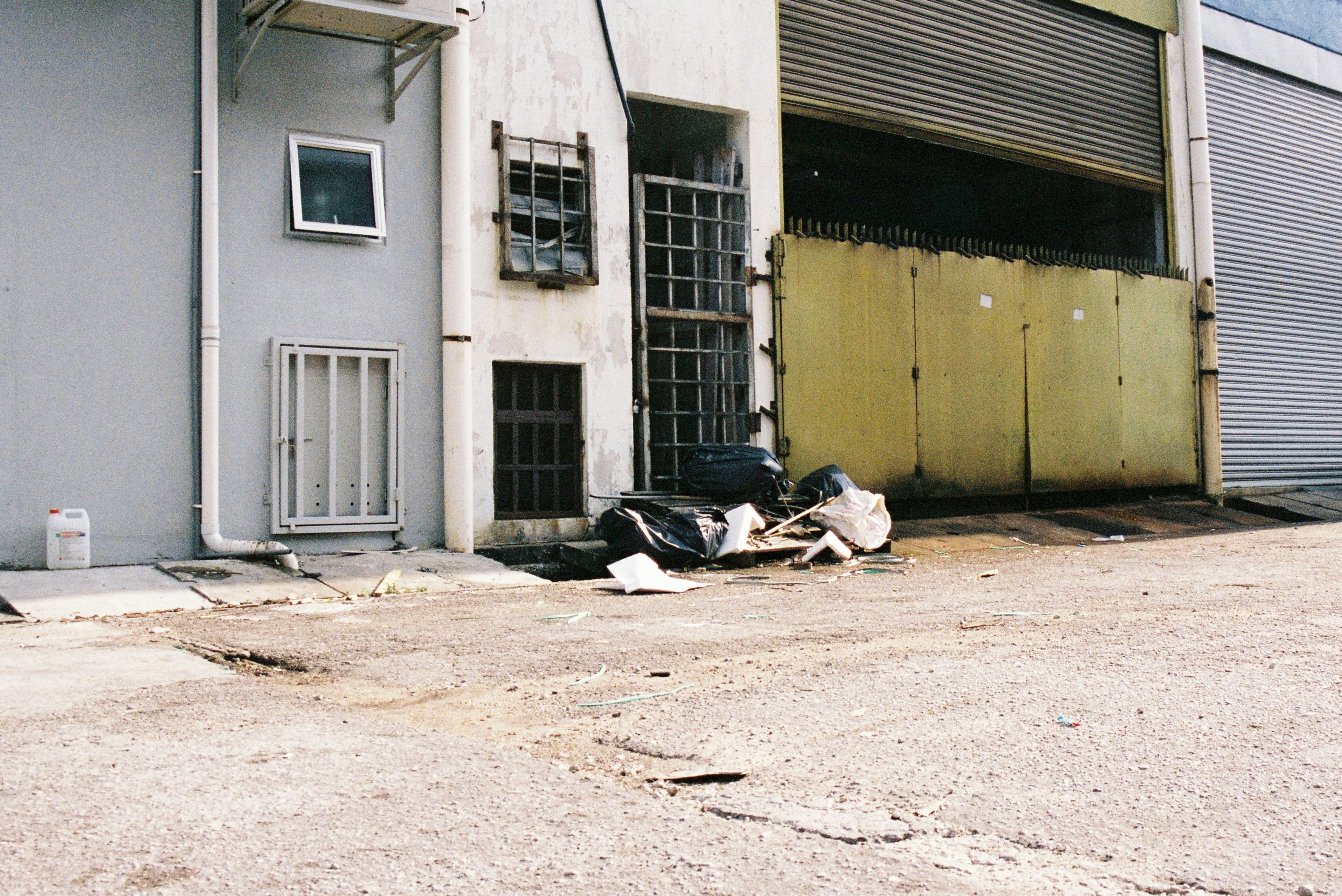 a pile of luggage sitting in front of a building