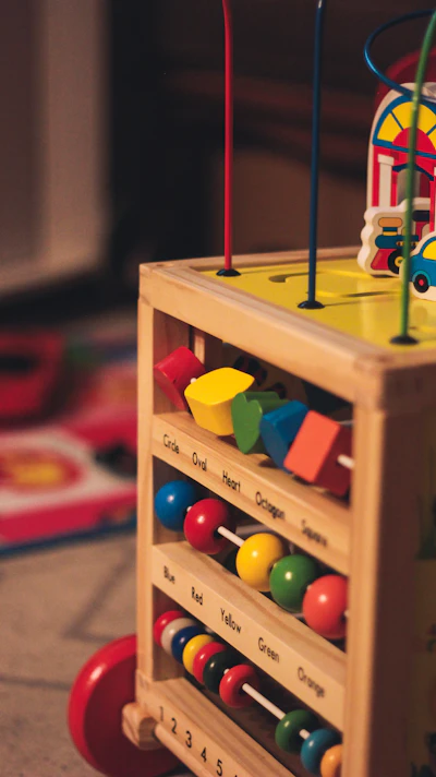 Wooden sensory play pieces laid out on a table