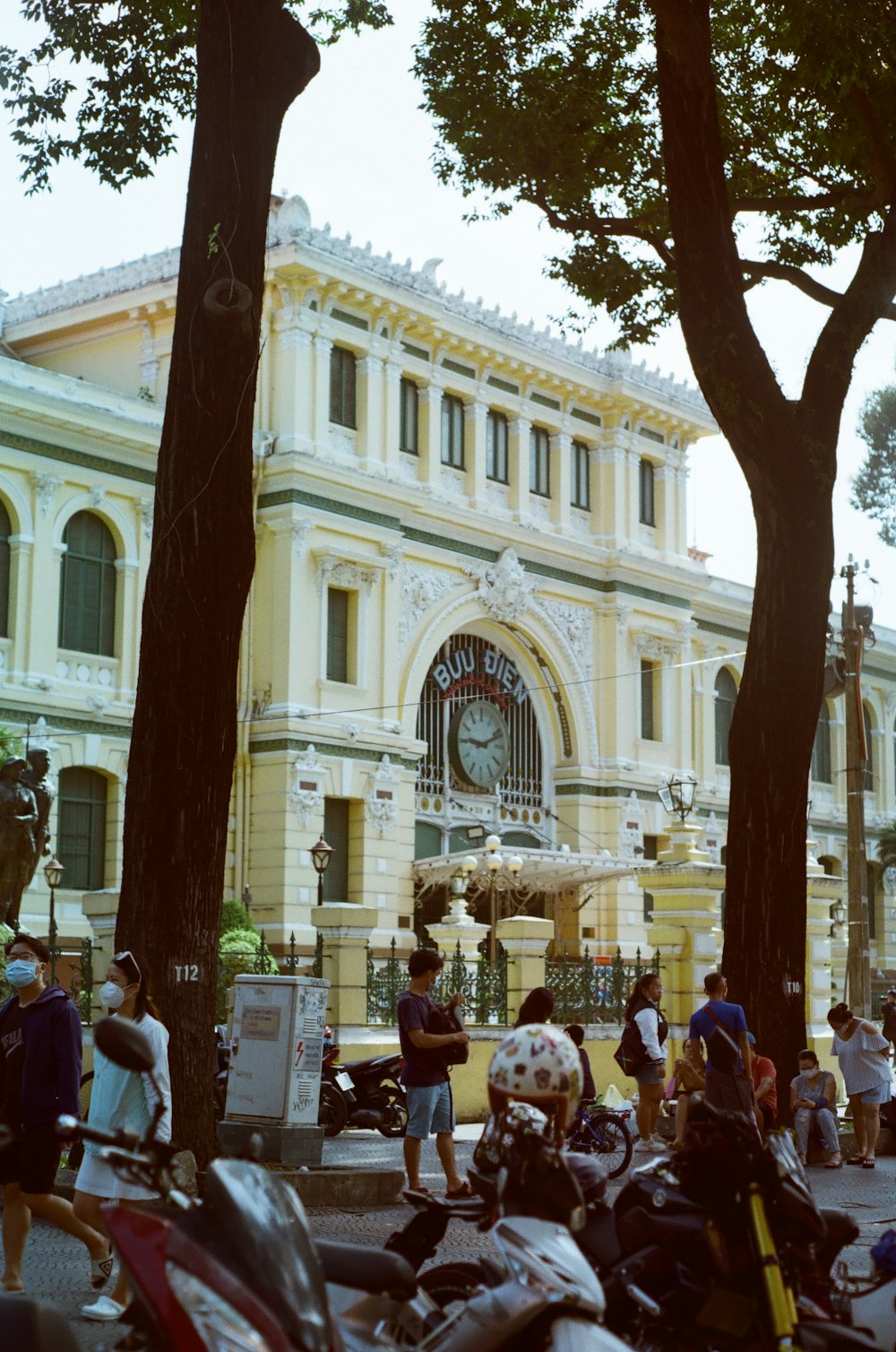 a group of motorcycles parked in front of a building