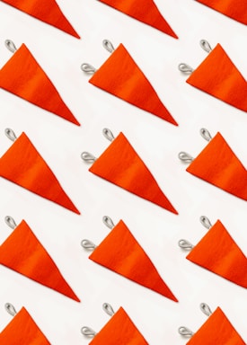 a close up of a bunch of orange triangles