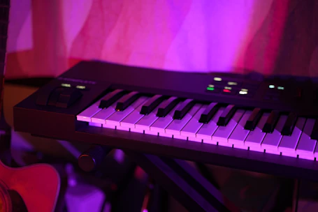 a keyboard that is sitting on a stand