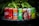A lineup of various soda cans placed on a dark surface with green foliage in the background. The cans include Coca-Cola, Fanta, Sprite, A&W, and Schweppes among others, each displaying vibrant branding and distinct color schemes.