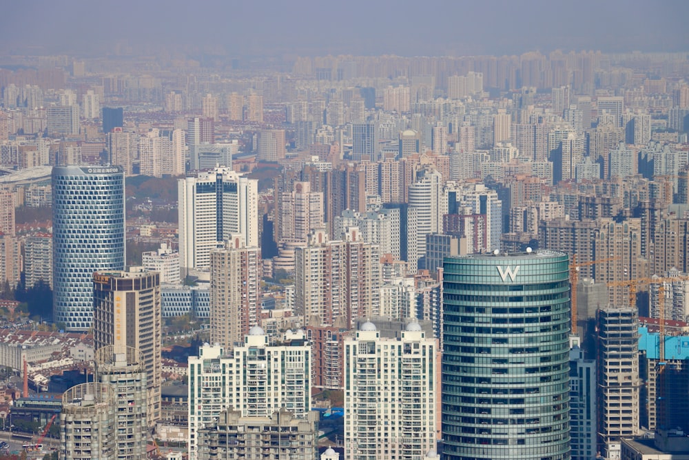 a view of a large city with tall buildings