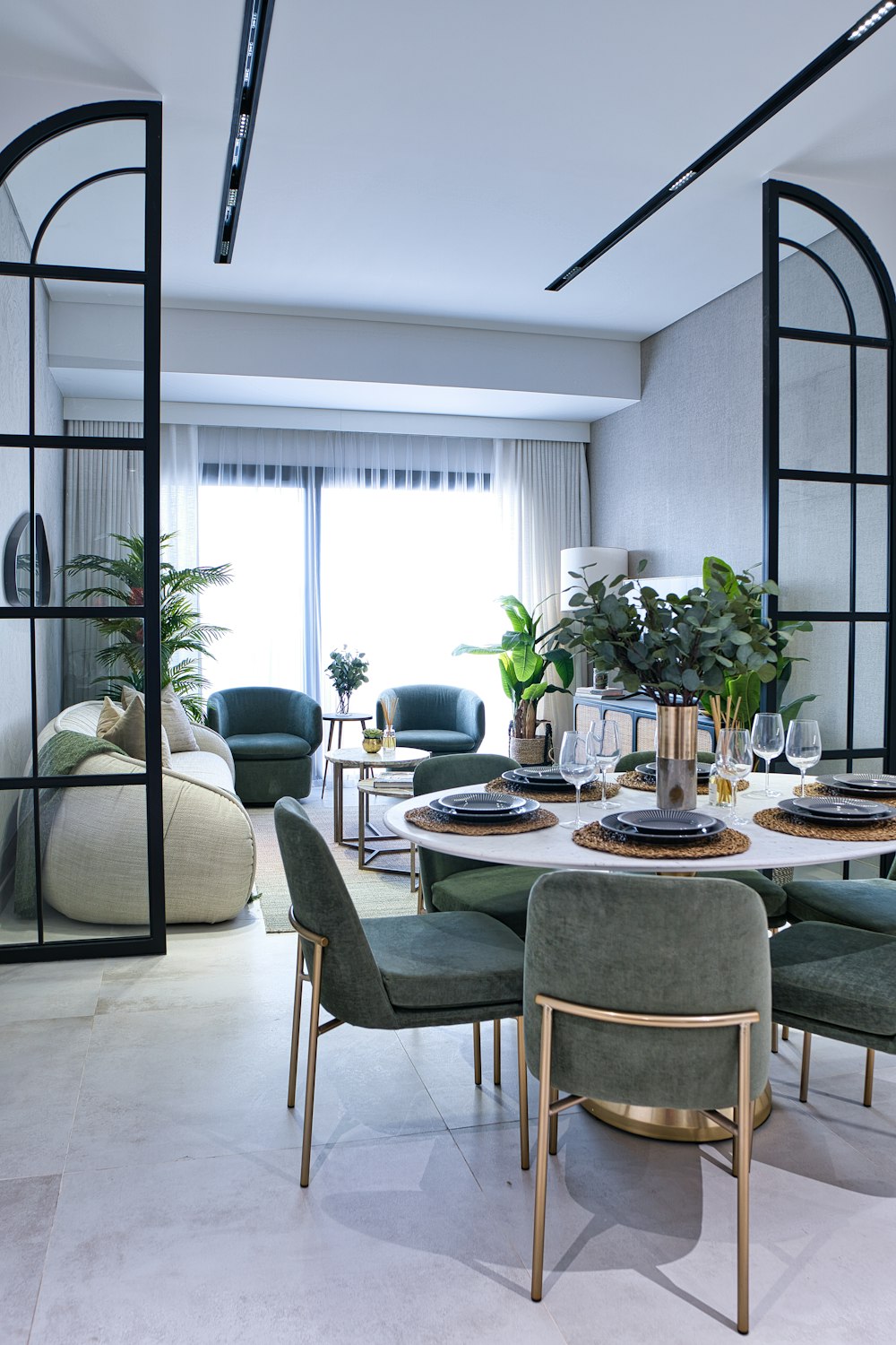 a dining room with a table and chairs