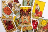 a collection of tarot cards with different designs