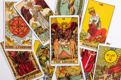 a collection of tarot cards with different designs