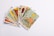 A collection of tarot cards spread out, with the card depicting 'The Star' prominently displayed on top. The cards feature intricate and colorful illustrations with various symbols and figures.