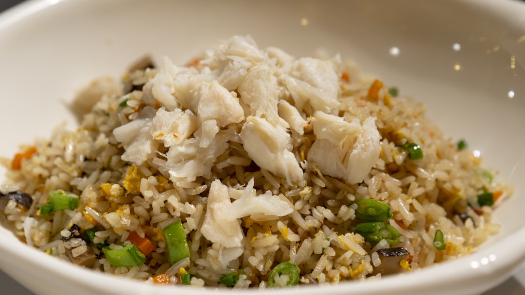 a white bowl filled with rice and vegetables, Crab Fried Rice