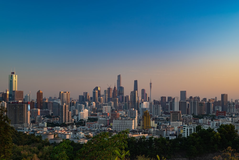 a view of a city from a hill