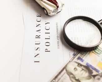 a magnifying glass sitting on top of a piece of paper