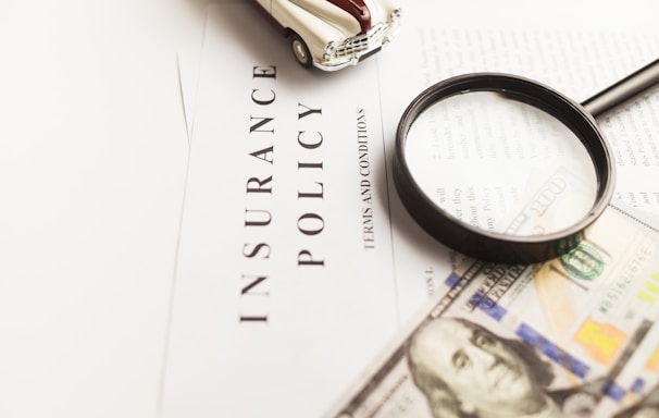 a magnifying glass sitting on top of a piece of paper