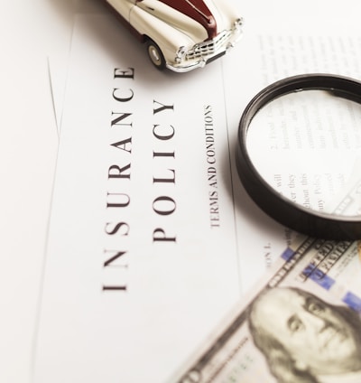 a magnifying glass sitting on top of a piece of paper