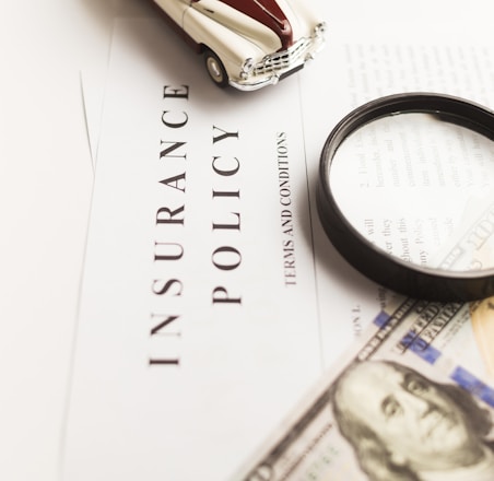 a magnifying glass sitting on top of a piece of paper