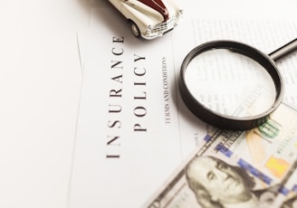 a magnifying glass sitting on top of a piece of paper