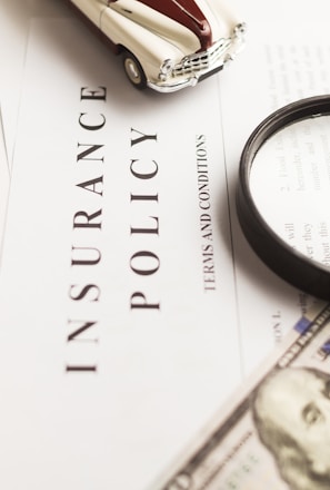 a magnifying glass sitting on top of a piece of paper