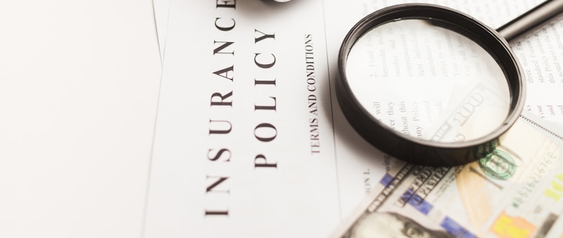 a magnifying glass sitting on top of a piece of paper