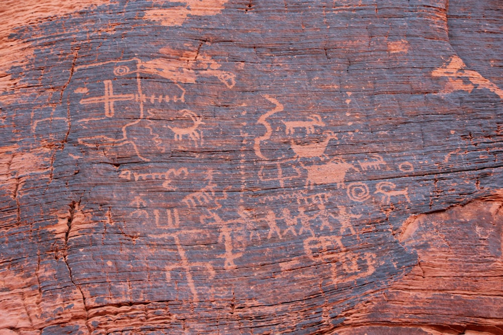 a rock with some drawings on it