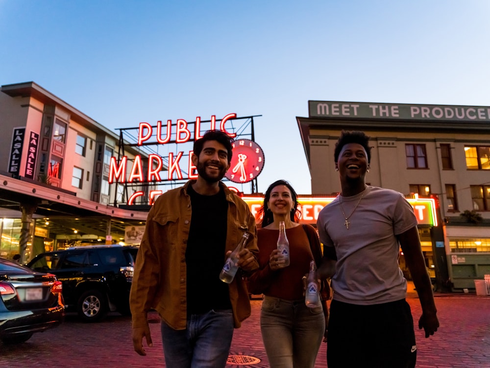 a group of people walking down a street