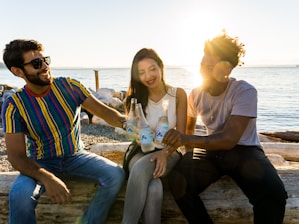 a group of people sitting next to each other