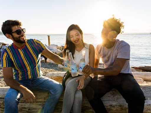 a group of people sitting next to each other