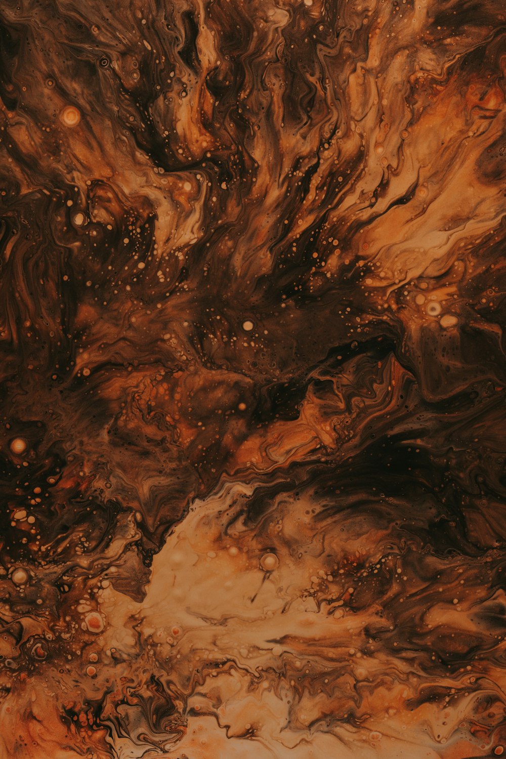 an abstract painting of brown and brown colors