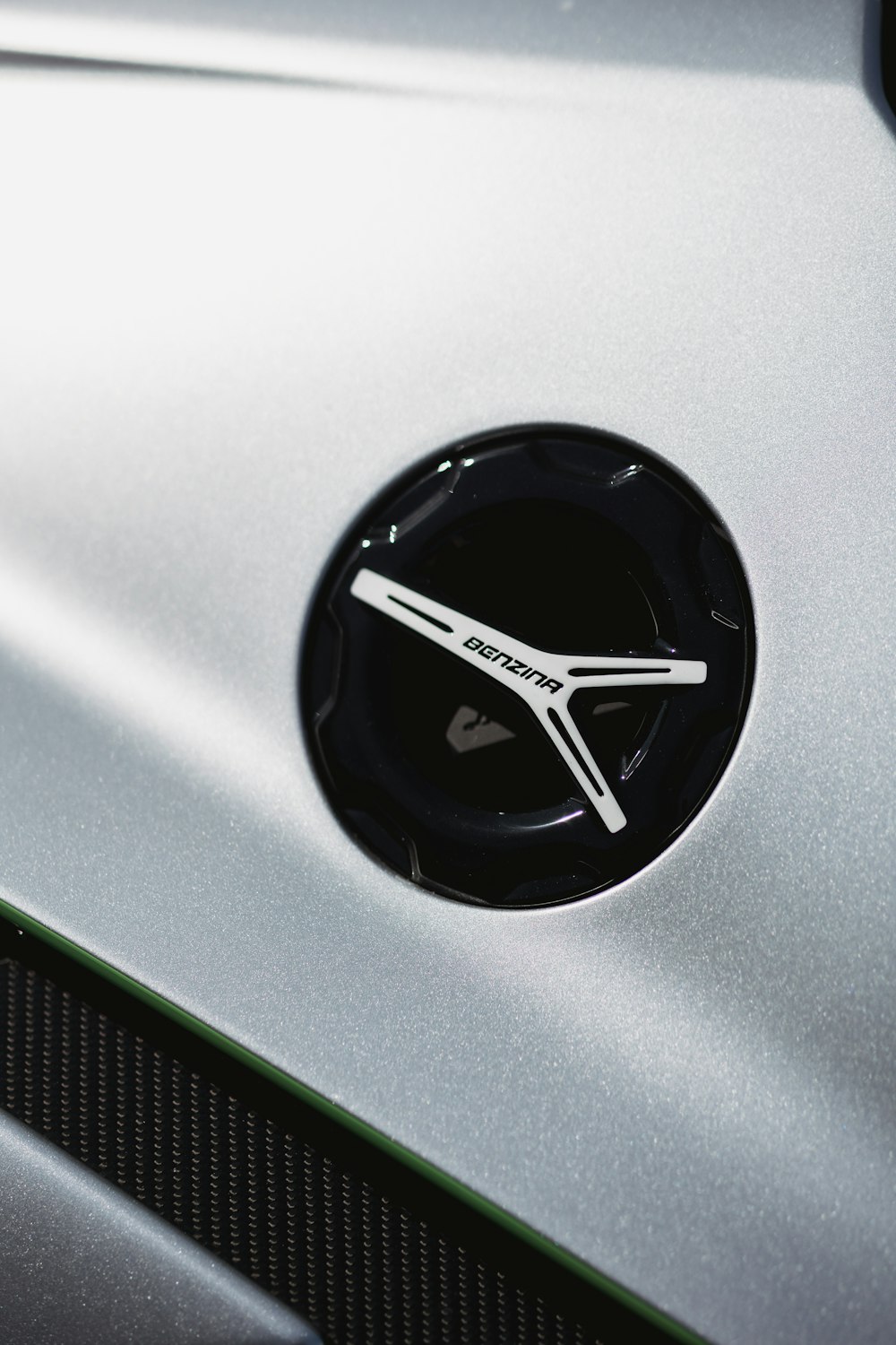 a close up of a clock on the side of a car