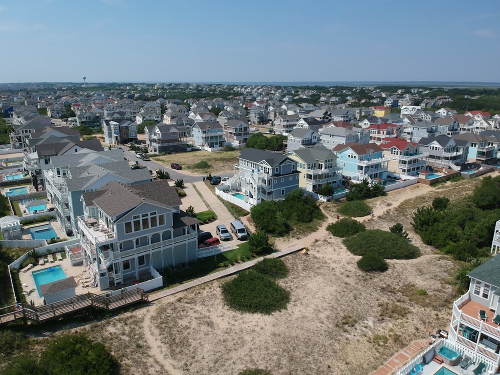 an aerial view of a beach town with a lot of houses