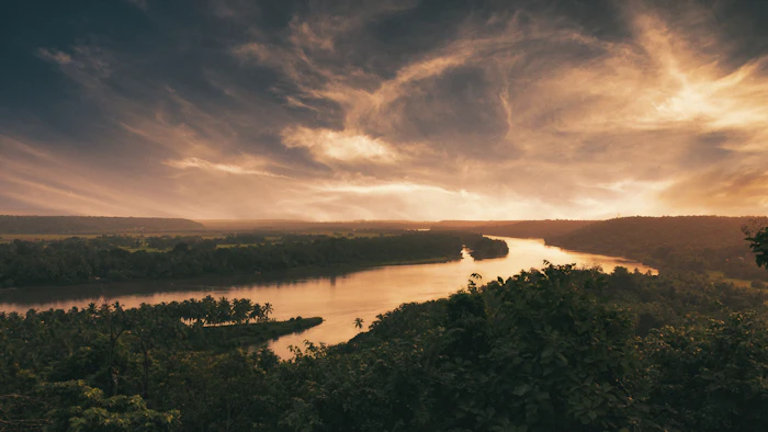 Sunset over a river in Konkan