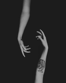 a woman's arm with a tattoo on it