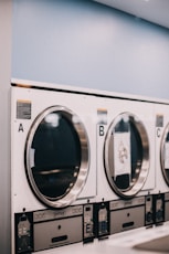 a row of washers sitting next to each other