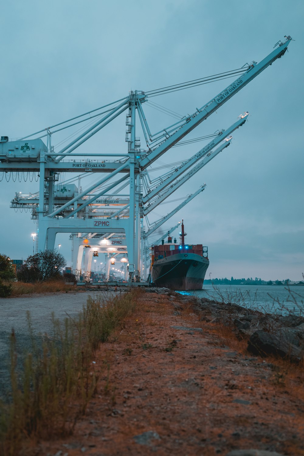 a large cargo ship docked at a dock