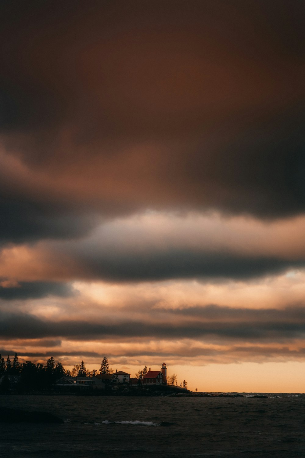 a sunset over a body of water