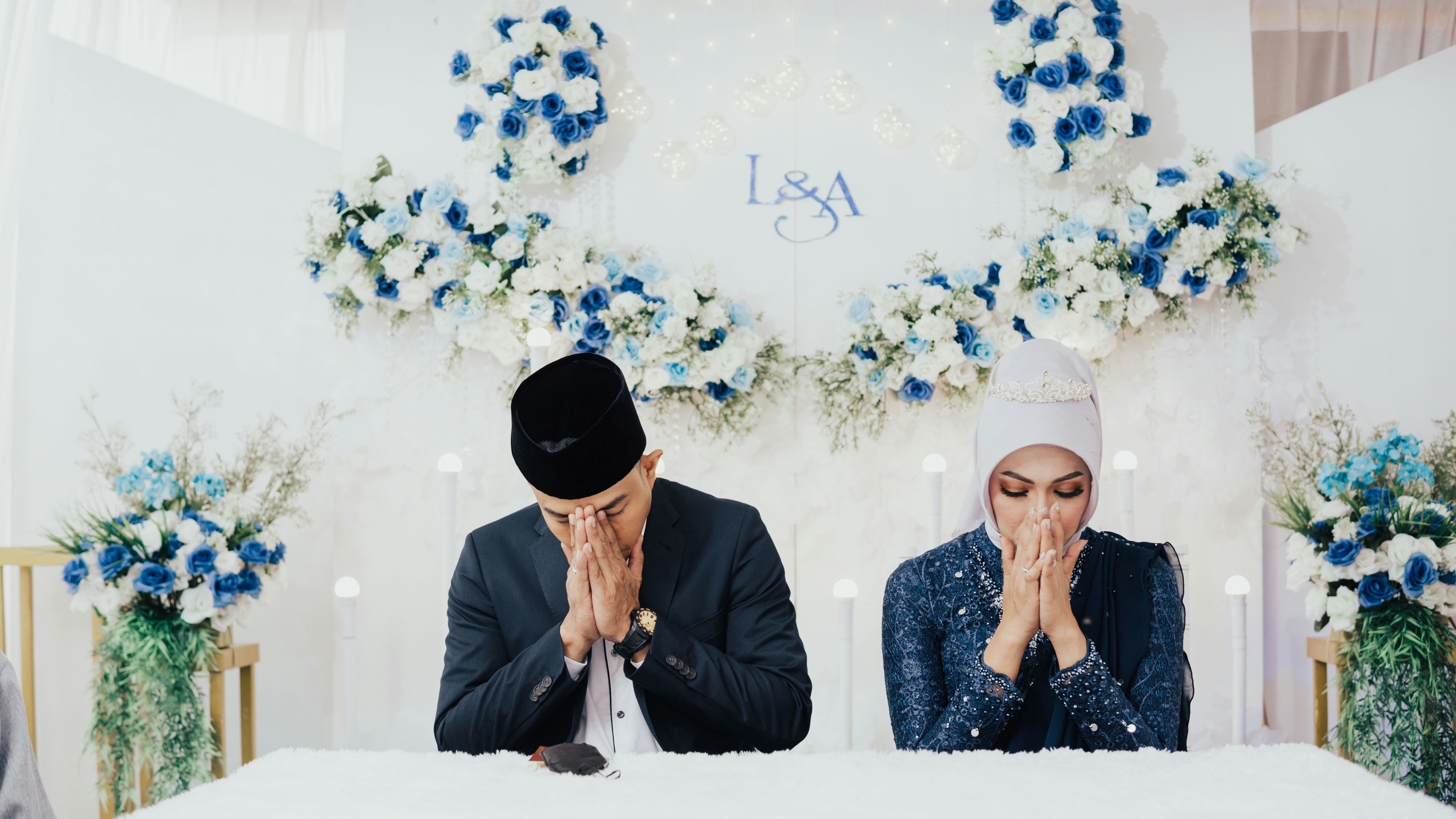 a couple of people sitting at a table