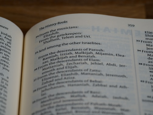 a close up of an open book on a table