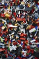 a pile of assorted legos sitting on top of each other