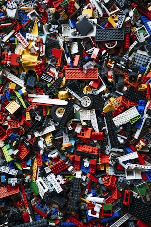 A colorful set of magnetic building blocks arranged in various creative shapes.