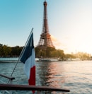 the eiffel tower towering over a body of water