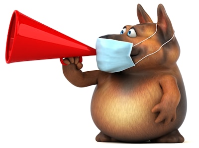 A cartoon-style, anthropomorphic dog holds a red megaphone with one hand while wearing a medical mask on its face. The dog has a round belly, prominent eyes, and big ears, displaying a playful and slightly comical appearance.