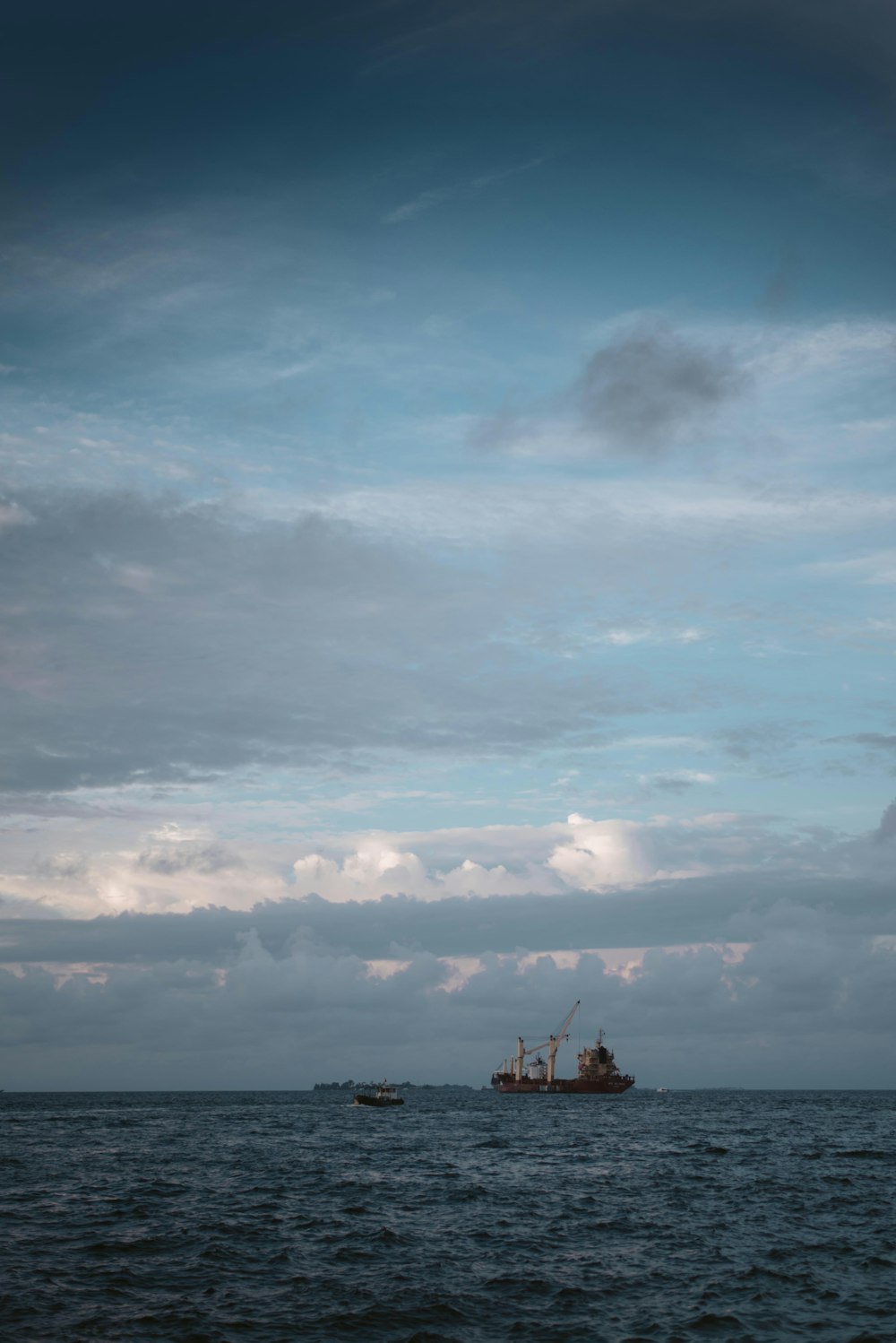 a large boat floating on top of a large body of water