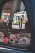 A vibrant image showcasing various car stickers and decals in a modern workshop.