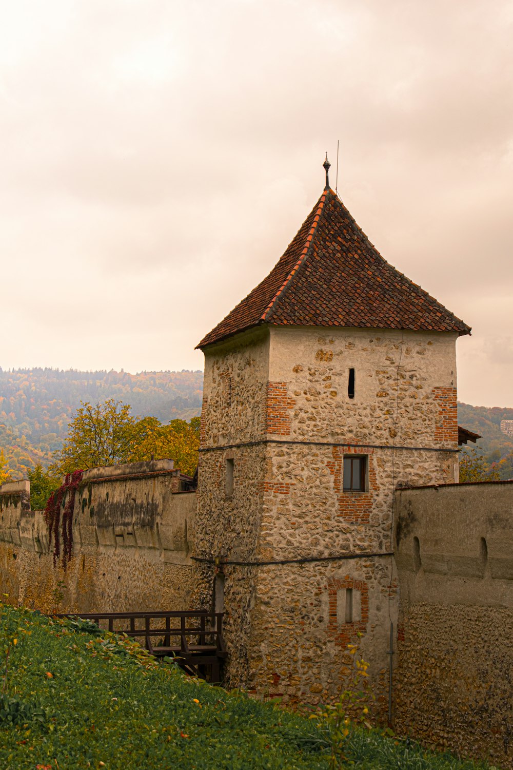 a stone building with a tower on top of it